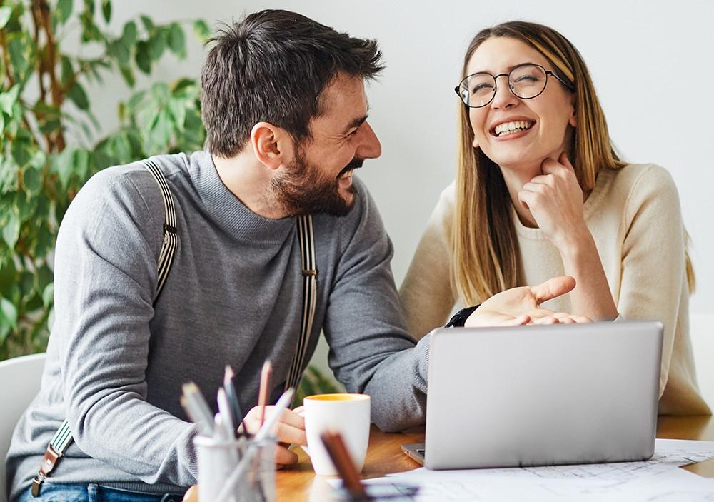 male and female enjoying their work
